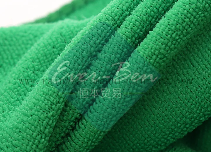 Green microfiber cleaning textile close-up