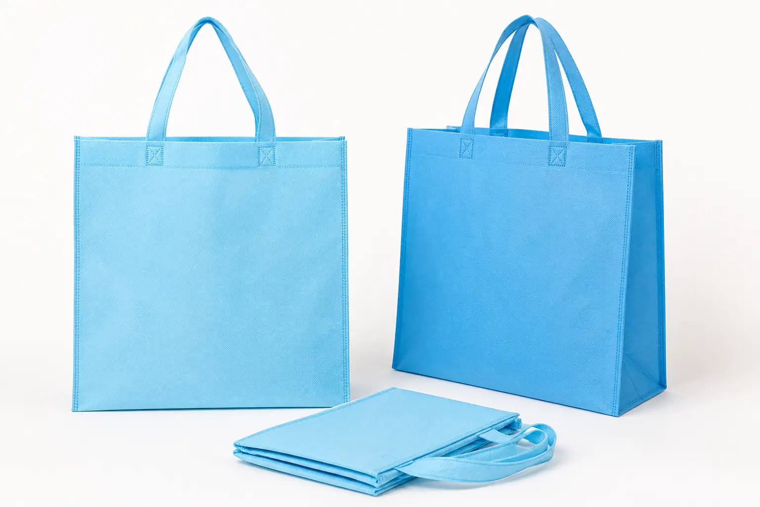 Complete blank blue nonwoven promotional shopping bags with loop handles and side gusset