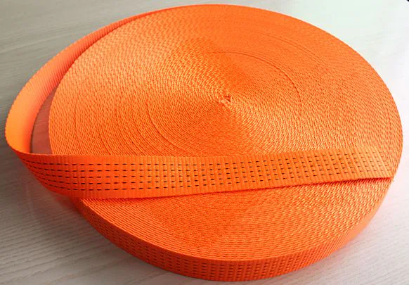 Complete orange woven webbing coil with loose tail and black tracer rows