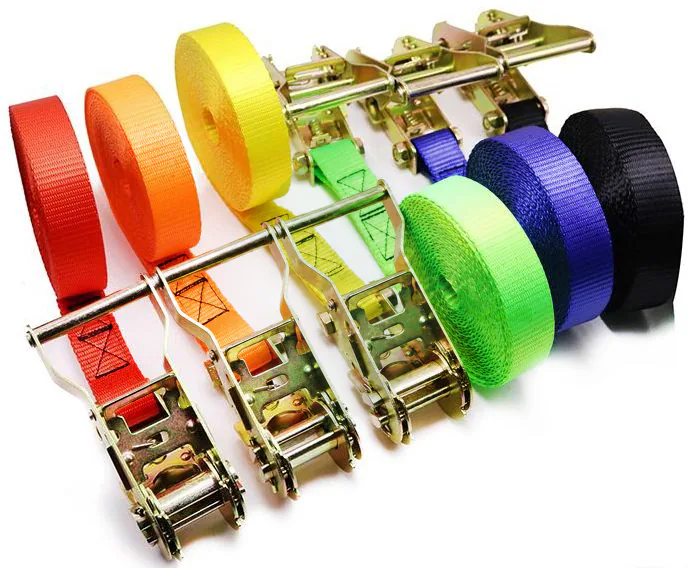 Multiple colored woven strap rolls paired with metal ratchet tensioners